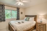 Master bedroom has the gorgeous king bed and furniture from a noble wood.